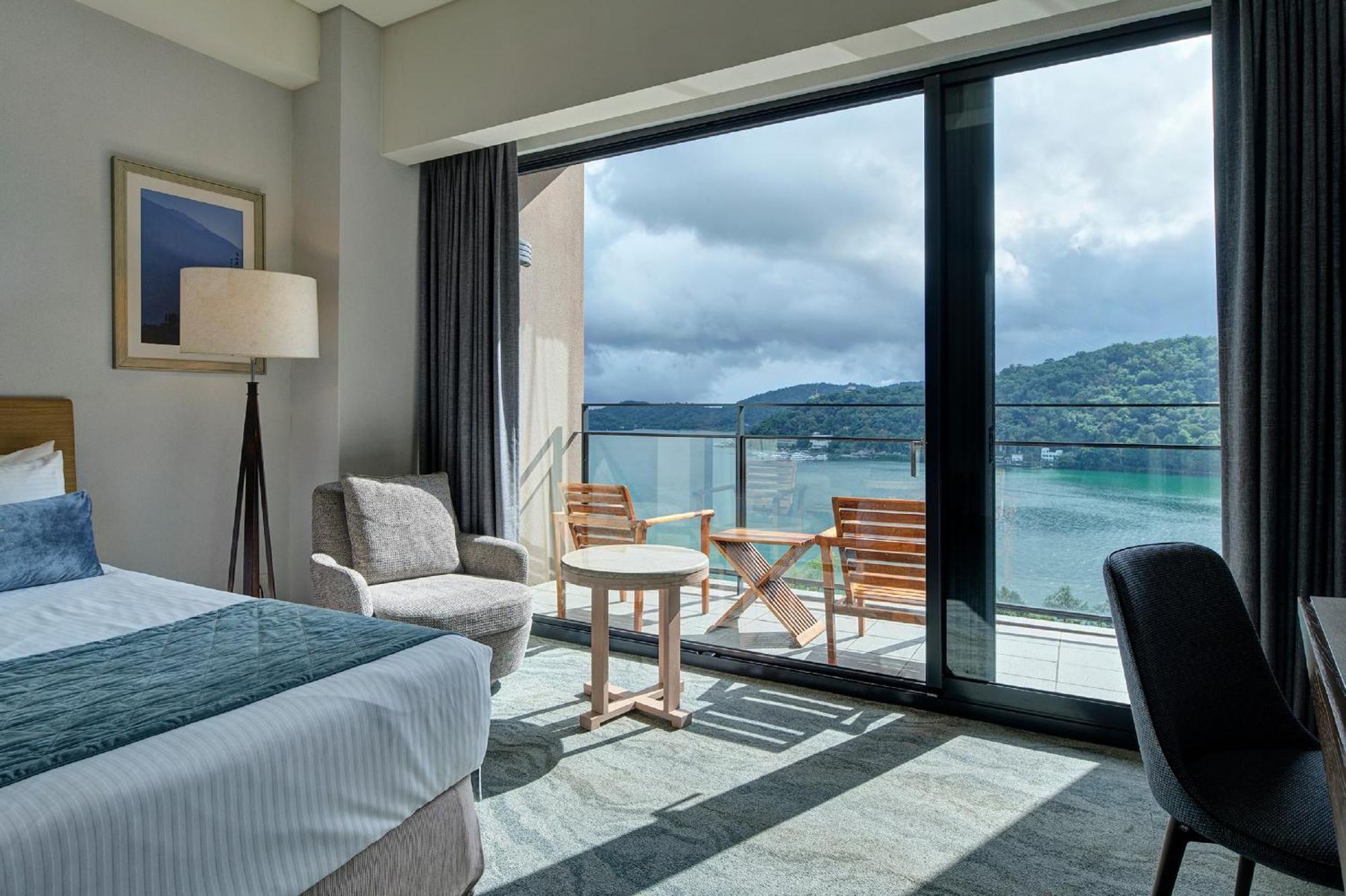Fleur De Chine Hotel Yuchi Rum bild A guest room at the hotel